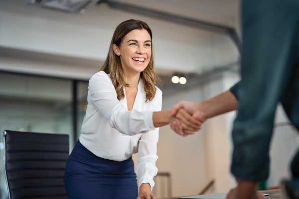 HR Consultant shaking hands with a new client
